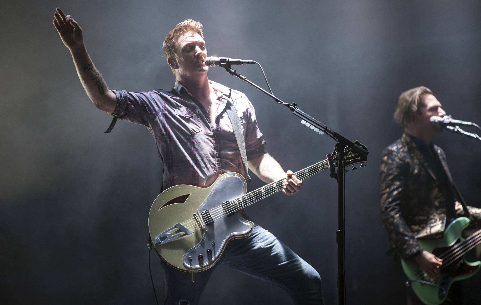 Singer/guitarist Josh Homme of Queens of the Stone Age performs at Charlotte Motor Speedway on May 6, 2018 in Charlotte, North Carolina. Credit: Jeff Hahne/Getty
