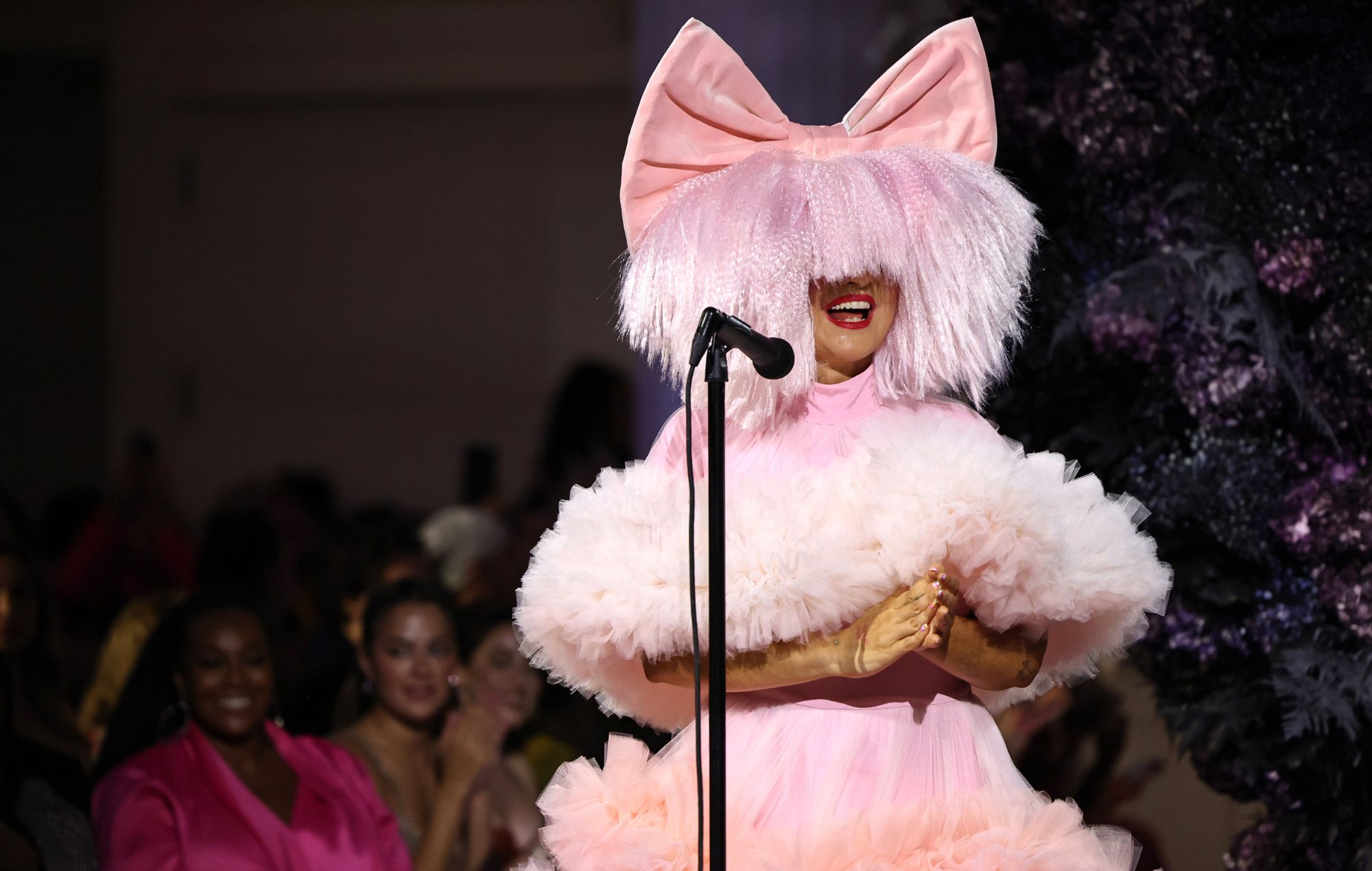 Sia performs on the runway during the Christian Siriano SS24 Runway Show at The Pierre Hotel on September 08, 2023 in New York City
